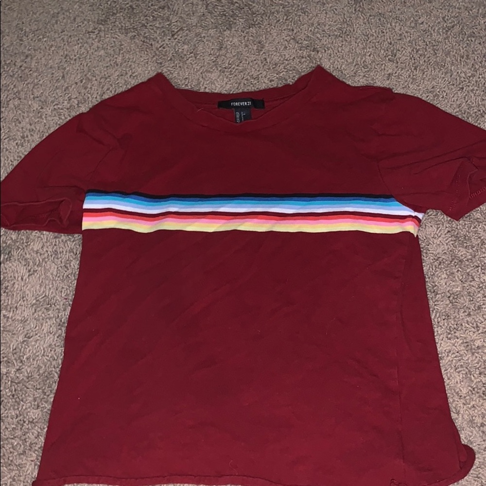 red t-shirt with rainbow stripe